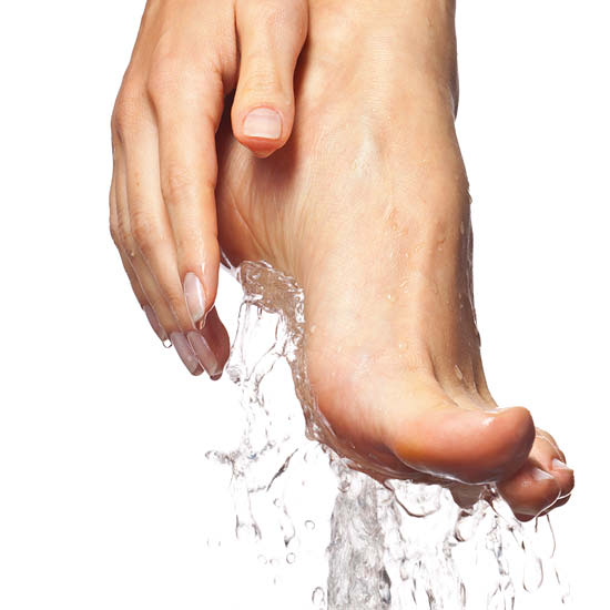 Hand in Feet in Splash Water