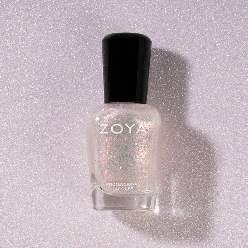 Khione Nail Polish Spill and bottle and brush