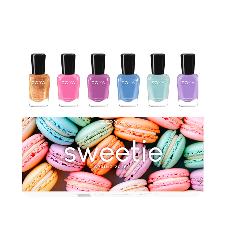 Zoya Sugar rose gold glitter nail polish on natural nails